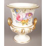 A 19th century Derby porcelain urn with hand painted floral decoration. 20.5cm. One serpent handle