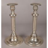 A pair of Russian silver candlesticks with detachable nozzles. Punch marks for St Petersburg. Height