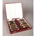 A boxed Edwin Blyde and Co Sheffield, Antler handled six piece knife and fork set.