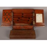 An early 20th century oak desk tidy along with a mahogany storage bow with cribbage board top.