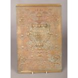 A decorative brass back panel from a Cash Register (National Dayton Ohio USA). H:33cm, W: 21.5cm.