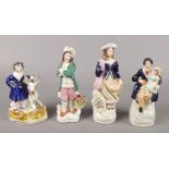 A series of four Staffordshire figures, two of which are flatbacks. To include Gentleman with flower