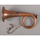 A early 20th century Copper hunting horn by Ball Beavon & Co, London.