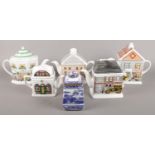 Six novelty teapots, produced by Wade and Ringtons.