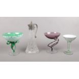 Four pieces of glassware. To include a Falstaff Claret jug and three pieces of Jozefina Krosno