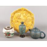 A collection of oriental items. Includes Chinese terracotta teapot, cloisonne vase, ginger jar and