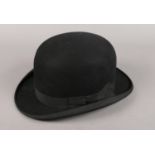 A Lincoln and Bennett bowler hat. Size of hat: 6¾.
