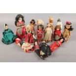 A collection of vintage toy dolls. To include wooden and porcelain examples.