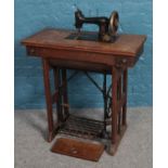 An early 20th century Vesta treadle sewing machine.