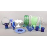 A selection of coloured glass. To include vases, a handkerchief vase and a milk glass small comporte