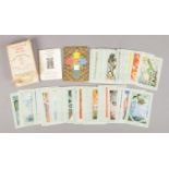 Thoth tarot cards, designed by Aleister Crowley, cards 14cm x 9.5cm, in original box. Cards in