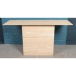 A two-piece marble dressing table/TV stand (135cm x 72cm x 45cm).