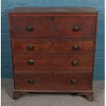 A Victorian oak splitting secretaire chest of 4 drawers. (116cm x 104cm) In need of attention.