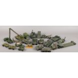 A large collection of Corgi and Dinky army vehicles. Includes tanks, jeeps and helicopter.