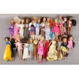 A box of child's dolls and dolls clothing. Includes Bratz and Tanya examples.