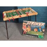 Two football games. Table football with removable legs, Parker Striker five-a- side football game (