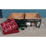 Two boxes of glassware. Cut crystal decanter, various cut crystal glasses.