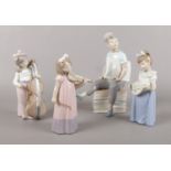 Four NAO by Lladro figures. 24.5cm tallest.