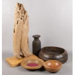 A collection of Wood & Treen. Large piece of driftwood on plinth, various bowls, vase.