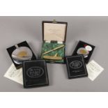 Three boxed collectable items. Includes Dalvey Pocket Flask, Dalvey Pocket Cup and a Halley golf