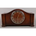 A Mahogany Art Deco style mantle clock. Dial engraved Foreign, in working order.