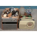 Two boxes of miscellaneous items. To include an enamel mincer, two vintage radios and a three