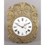 An ornate French Louis Loinard wall clock. Chiming on a coil gong.