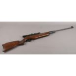 A Edgar Brothers MOD.60 .22cal break action air rifle with (4x20) scope. serial no 0402 04219. CAN'T