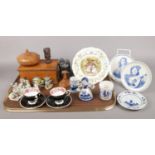 A tray of collectables. To include a wooden carved African head, two Royal Albert cups and