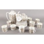 A quantity of Susie Cooper teawares in the Venetia pattern. Including Teapot, sugar bowl, milk