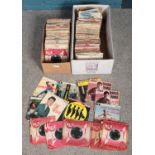 Two boxes of single records. Including rock & roll, Elvis, The Shadows, etc.