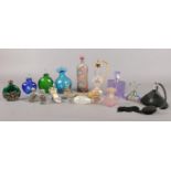 A collection of fifteen perfume bottles and atomisers. To include two Art Deco style bottles as