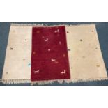 Three IKEA pure wool RUGS 60 x 90cm, 2 cream based, the other red.
