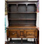 A LATE VICTORIAN DRESSER ON candy twist legs and two cupboards with plate rack gantry 137cm length