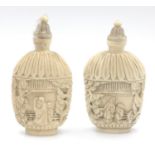 BEAUTIFUL PAIR OF ANTIQUE ORIENTAL CARVED SNUFF BOTTLES, hand carved with fitted stoppers, 7cm