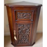 VICTORIAN ORNATELY HAND CARVED corner cupboard with key