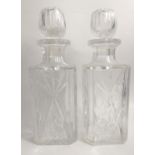 QUALITY - A pair of heavyweight CRYSTAL WHISKY DECANTERS standing approx 28cm high.