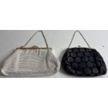 Two SUPER QUALITY! evening bags, one black fabric, the other white.