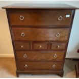 A STAG style chest of 7 drawers