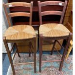 Two Reed seat pad bar stools 73cm from the floor to the seat pad