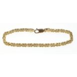 Matching with previous lot chain) A SUBSTANTIAL weight box 750 stamped yellow gold bracelet length