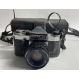 VINTAGE PRAKTICA super TL camera in protective case.