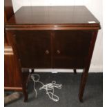 An old SINGER SEWING MACHINE cabinet in dark wood finish dimensions 55cm length x 43cm