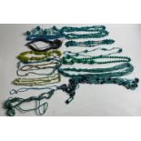 A cornucopia of beads in shades of aqua, teal, peacock blue, jade etc.
