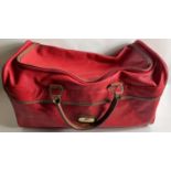 Red ICARUS weekend case with zip fastening, 2 handles and 3 outside pockets, one with zip