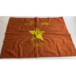 A VICTORY Flag from The Vietnam war 'QUYET THANG' 1967 28" x 21" brown base flag with yellow