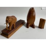 Two pieces of wooden decorative work, one a charming, tactile PENGUIN standing approx 11cm high,