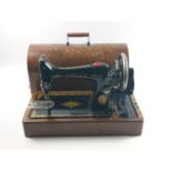 Antique SINGER SEWING MACHINE, registration Y2314955 which dates it to 1877.