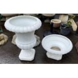 Two white resin planters smaller one 50cm diameter x 30cm height, and the larger 46cm diameter x