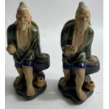 PAIR OF ORIENTAL MUDMEN standing approx 15cm tall, missing their fishing rods.
